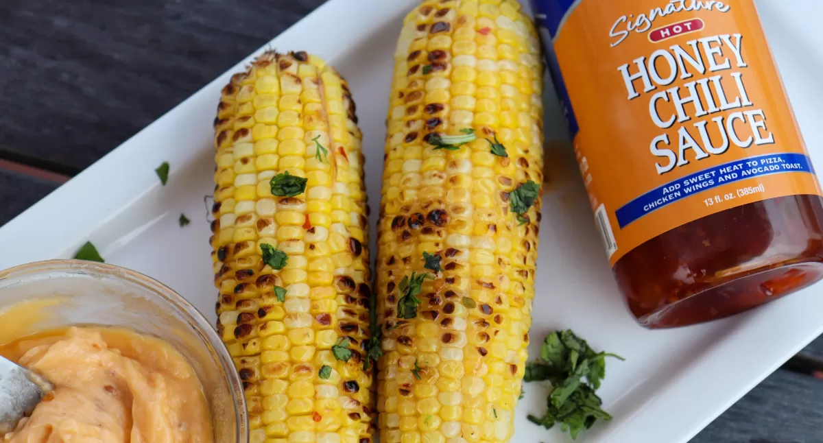 Grilled Corn with Hot Honey Chili Butter Sauce